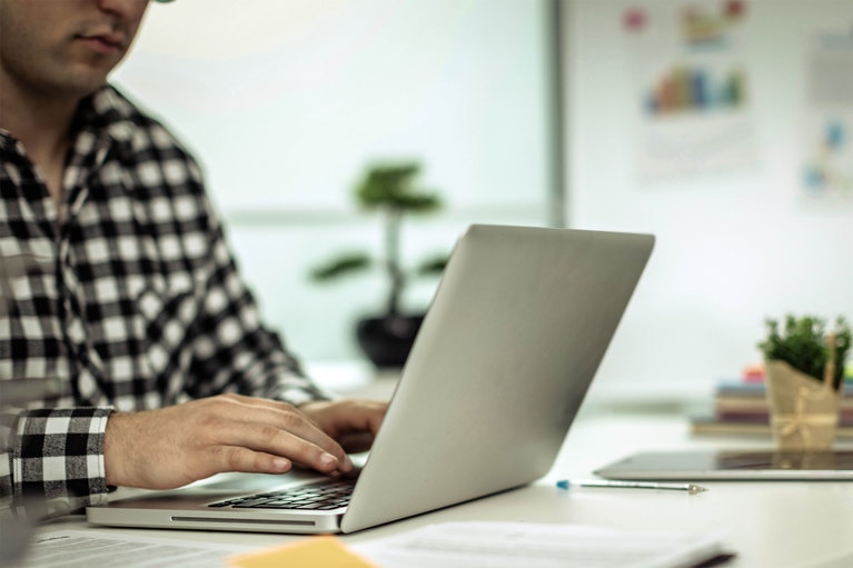 Photo of engineer on computer